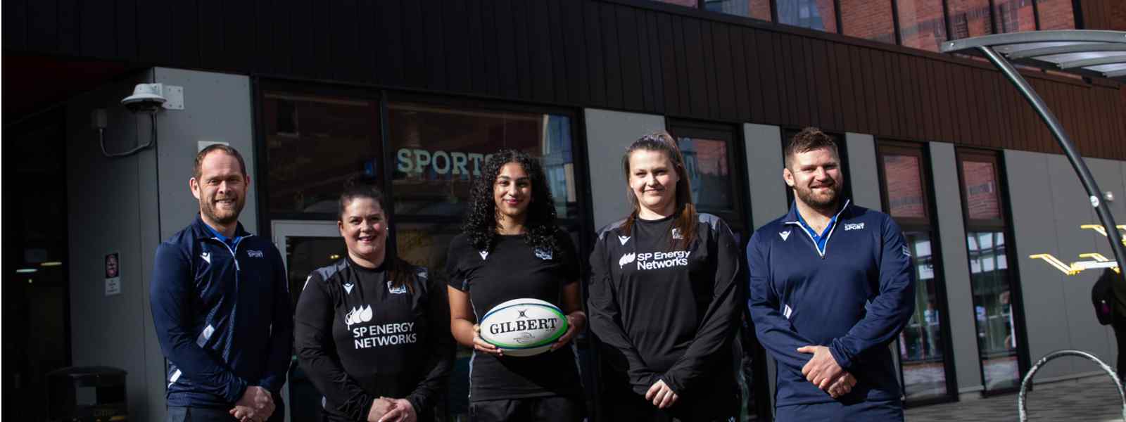 The launch of Strathclyde's Official Women's Performance Partnership with Glasgow Warriors. Left to right: University of Strathclyde Director of Rugby Gary Strain; Head Coach of Strathclyde's Women’s Rugby Team Ciara Campbell; co-captain of Strathclyde Women’s Rugby Team Aisha Zameer; Glasgow Warriors Head Coach Lindsey Smith; h Head Coach of Glasgow Warriors Strathclyde Director of Sport and Active Health Neil Brown