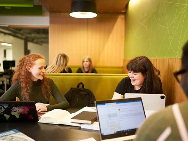 Students studying in library.