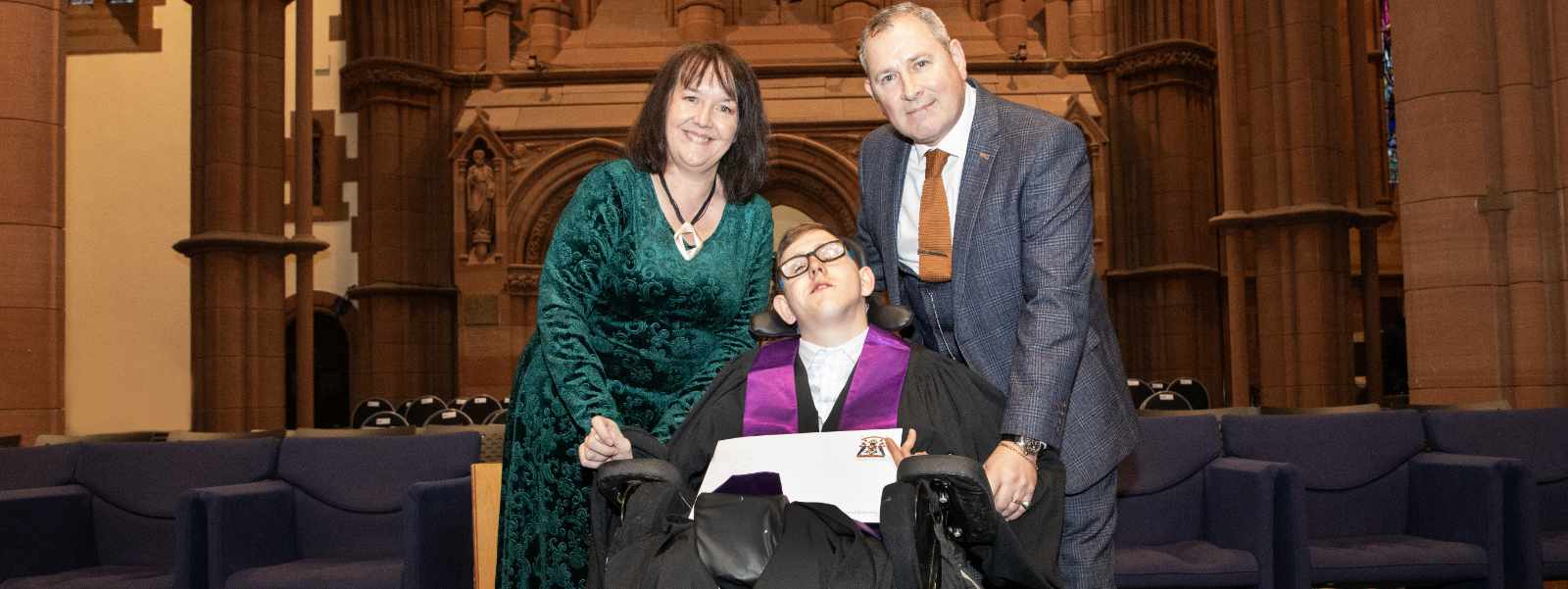 Conner Meechan and his parents on graduation day